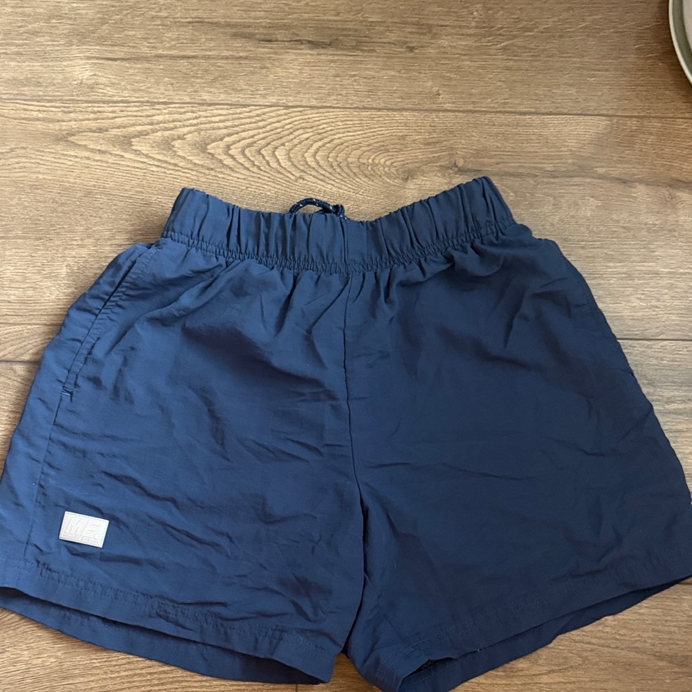 Melody Ehsani Navy Blue Shorts with Tan Patch